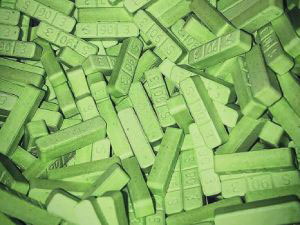 Closeup Image of Green Xanax bar tablet