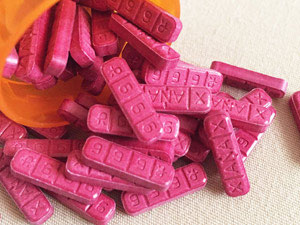 Closeup Image of Red Xanax Bar tablet